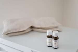 Aromatherapy and eye pillows in a massage therapy room in Asheville, NC