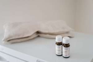 Aromatherapy and eye pillows in a massage therapy room in Asheville, NC