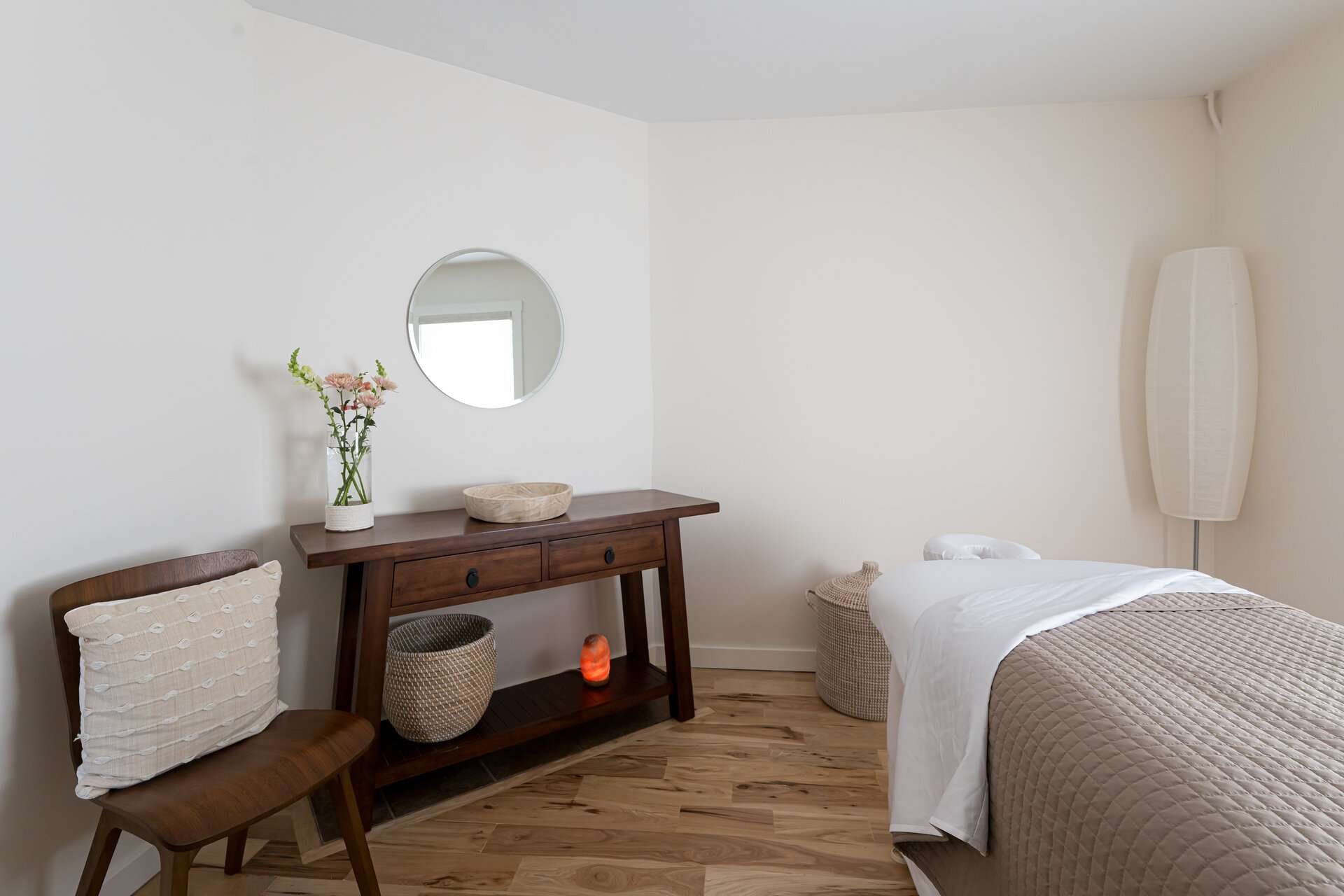 Clinical Massage Therapy room in Soothing Neutral tones and soft natural lighting